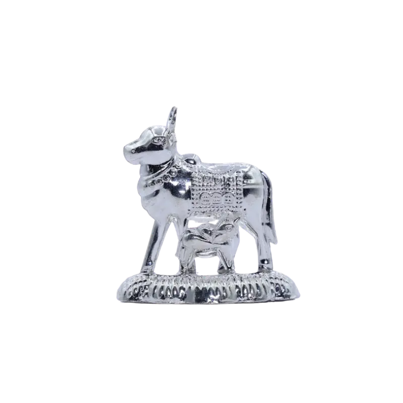 Handcrafted silver Nandi idol with calf on an engraved base