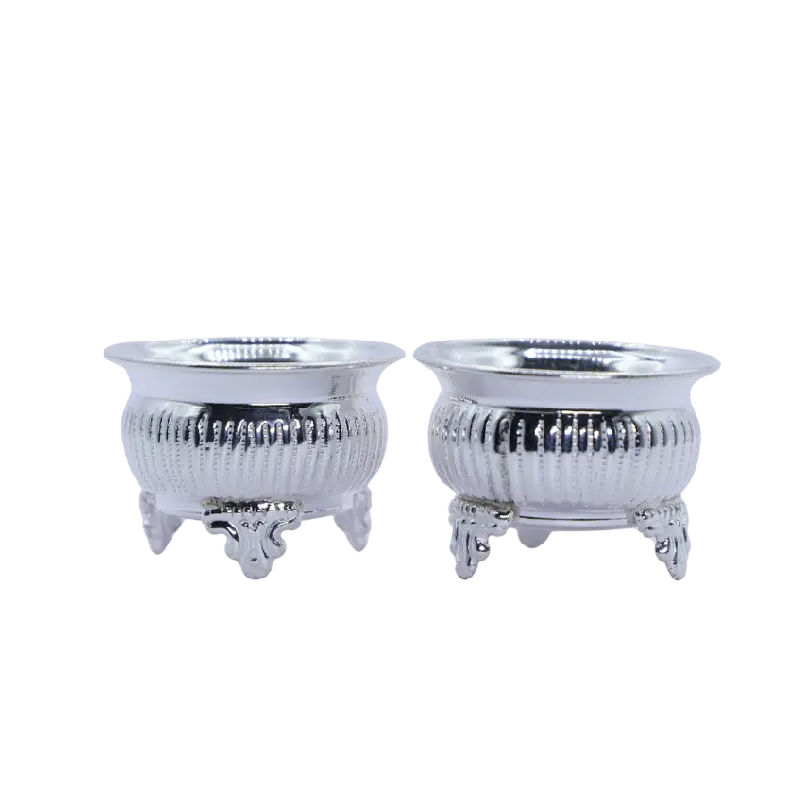 Pair of silver bowls set on ornate claw feet