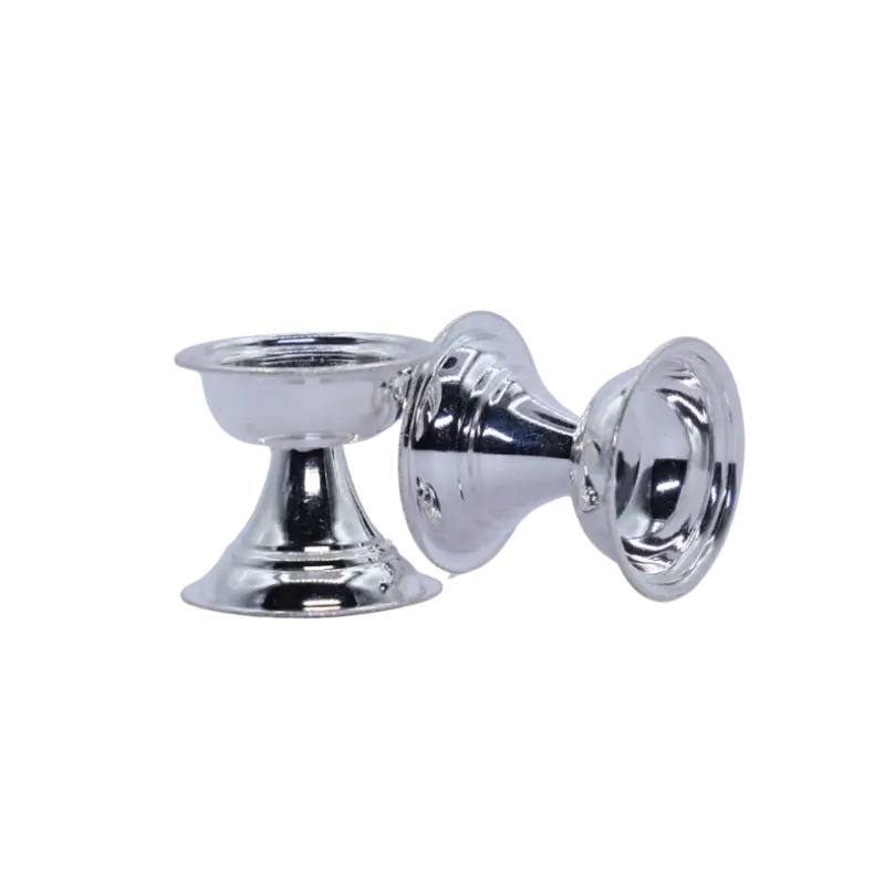 Pair of bell-shaped silver diya stands