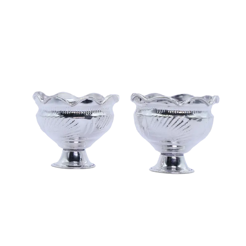 Pair of silver bowls with a scalloped rim and hand engraving